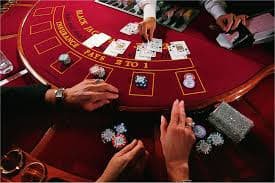 Live Super Sic Bo dealer studio with three transparent dice cube under professional lighting
